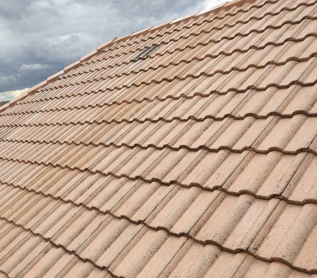 Weathered terracotta tile roof before restoration - Ambient Civil Auckland