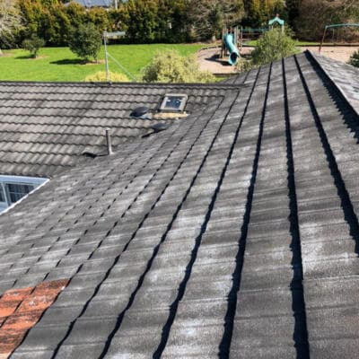 Concrete tile roof maintenance on a residential home - Ambient Civil Auckland