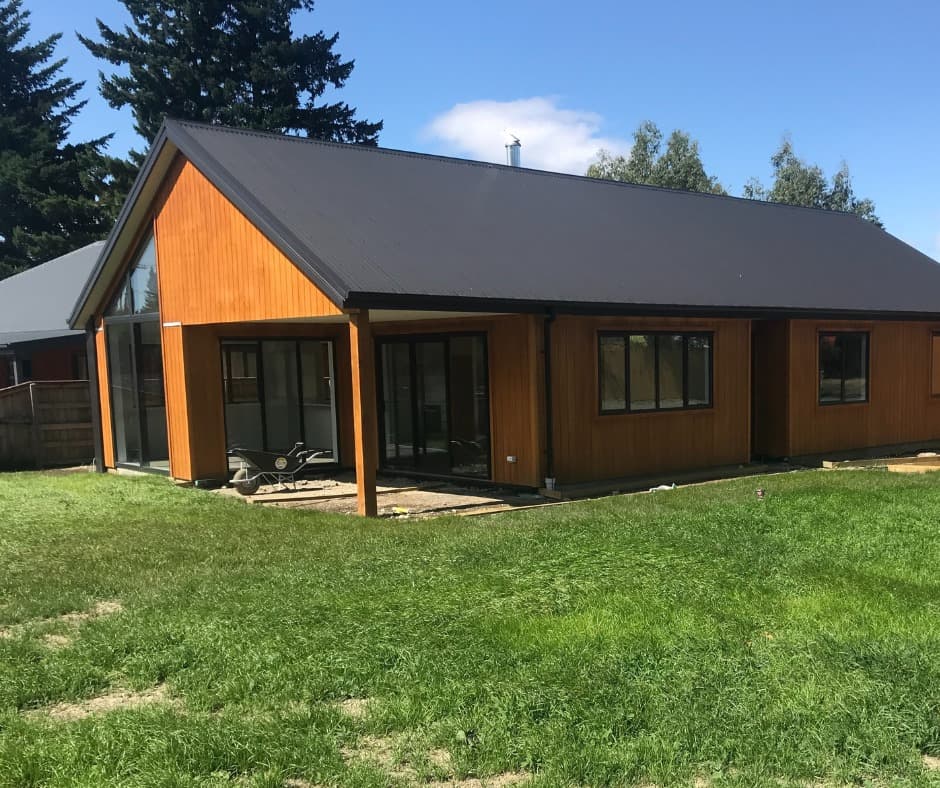 Near-finished cedar-clad new-build home with site works in progress - Ambient Civil Auckland