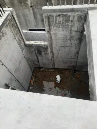 Cast concrete foundation walls with stormwater pipe - Ambient Civil Auckland