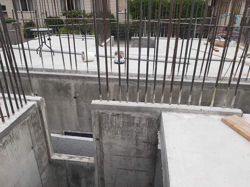 Poured concrete foundation walls with steel rebar starters - Ambient Civil Auckland