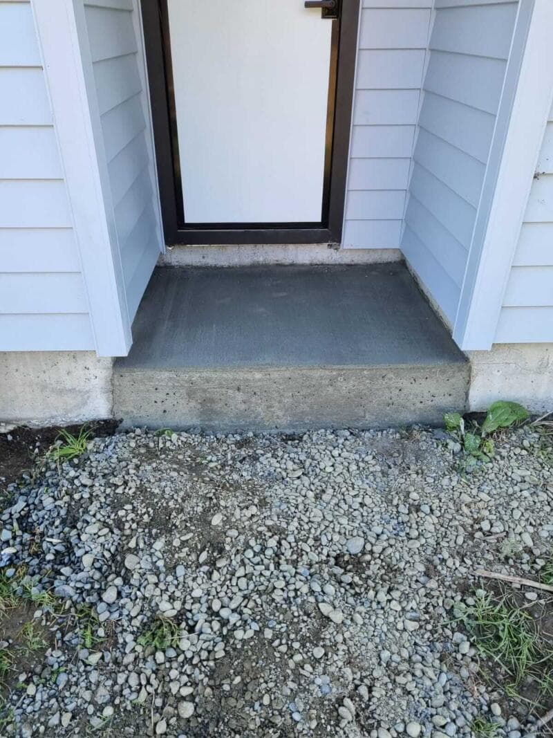 Finished concrete entrance step and landing on gravel base - Ambient Civil Auckland