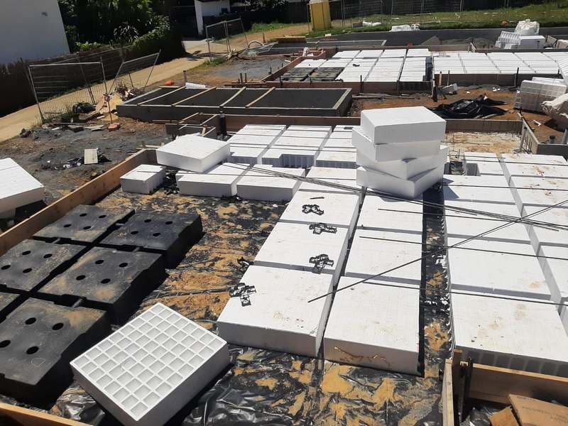 Foundation slab construction with polystyrene pods and reinforcing steel on building site - Ambient Civil Auckland