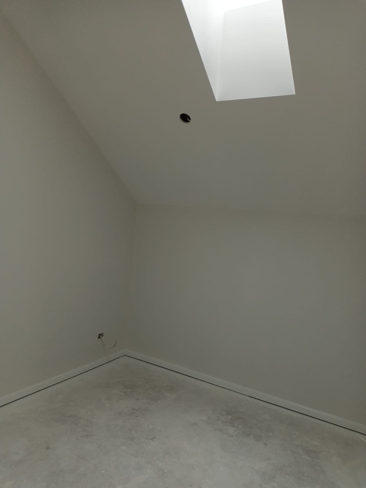 New-build room with skylight after plastering and painting during fit-out - Ambient Civil Auckland