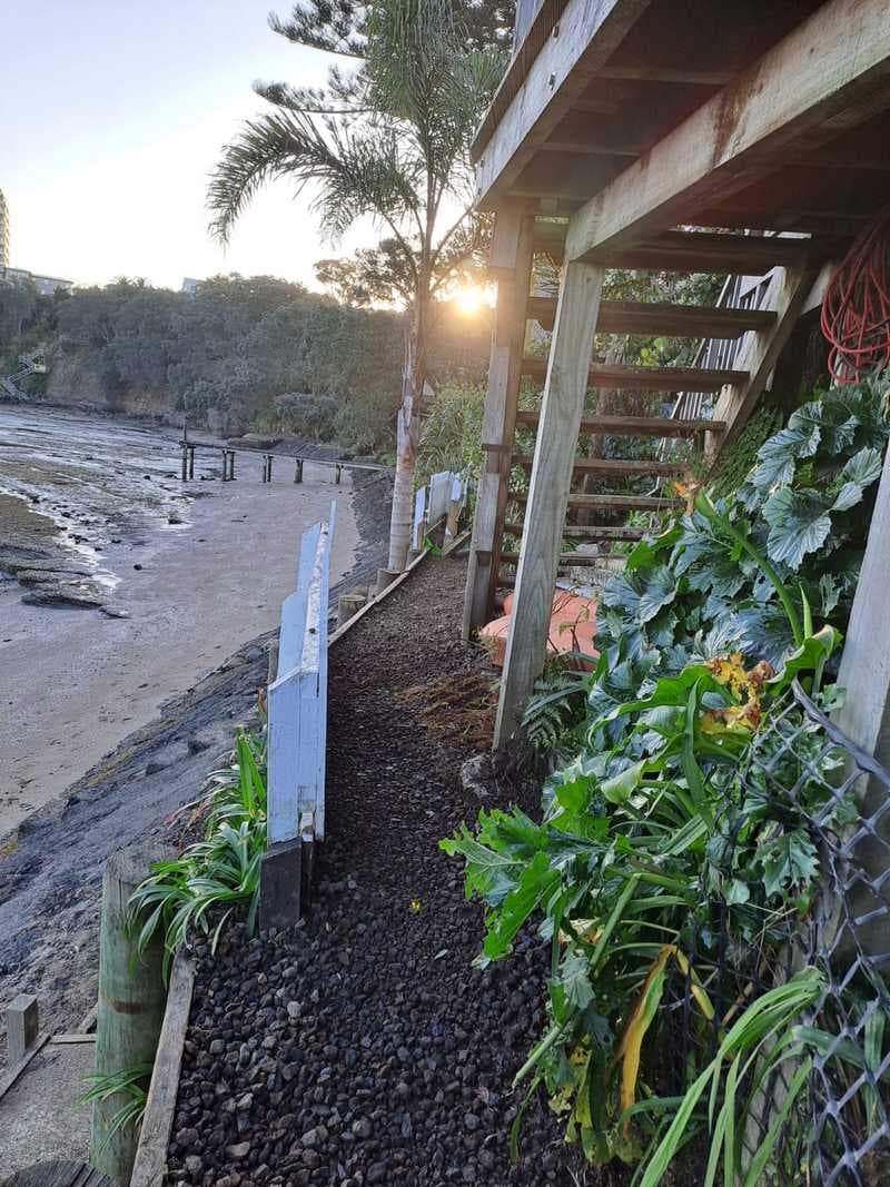 Freshly laid gravel pathway along the foreshore beside a deck - Ambient Civil Auckland